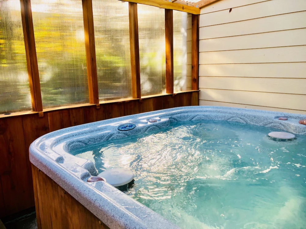 A hot tub is shown in the sun.